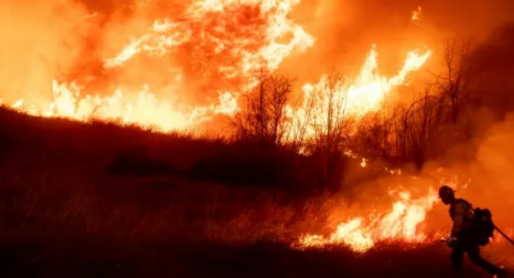 fireman in front of fire